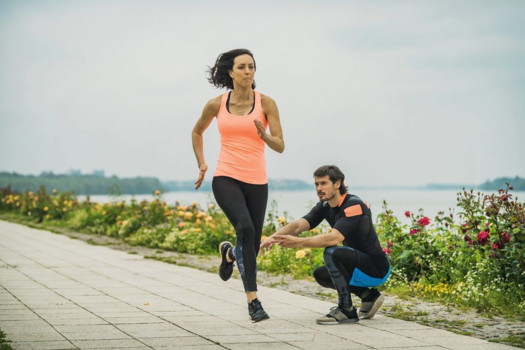 Woman running outside.